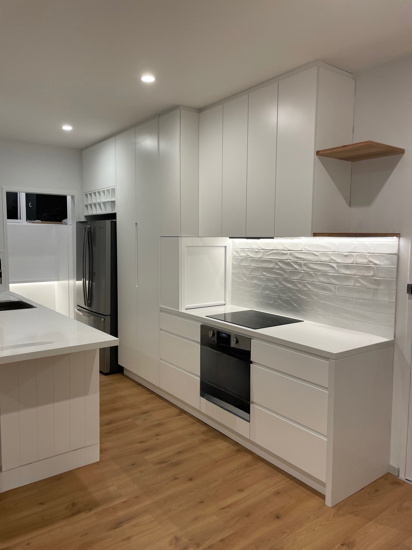 DJR custom kitchen detail — splashback and timber shelving